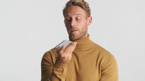 Man recording voice message