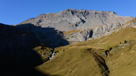 Les-Faverges-Rocky-Mountain-Sunlit-On-A-Sunny-Day-From-La-Tieche-Valley-In-Valais,-Switzerland