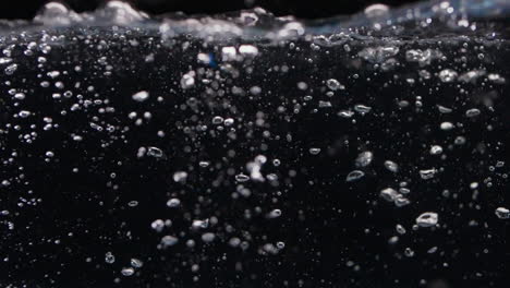 Tons-of-Slow-Motion-Rocks-Sink-in-Water-with-Bubbles-Drop