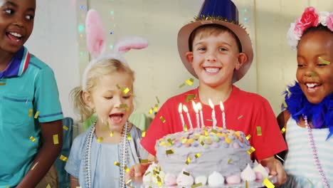 children celebrating birthday with cake and candles, festive animation over scene