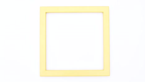 los lápices de colores aparecen dentro del marco amarillo en el tema blanco. detenga el movimiento