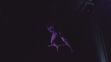 acrobat aerial dancing on trapeze. 
shot in 4k