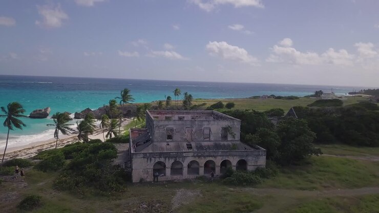 Aerial over an old abandoned builidng along the Caribbean coast of Barbados