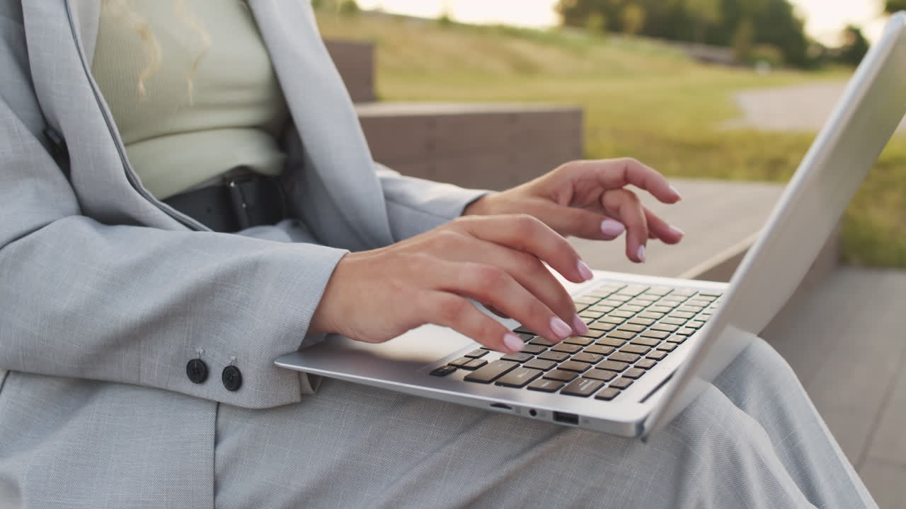 Hands of Business Lady Typing on Laptop Keyboard