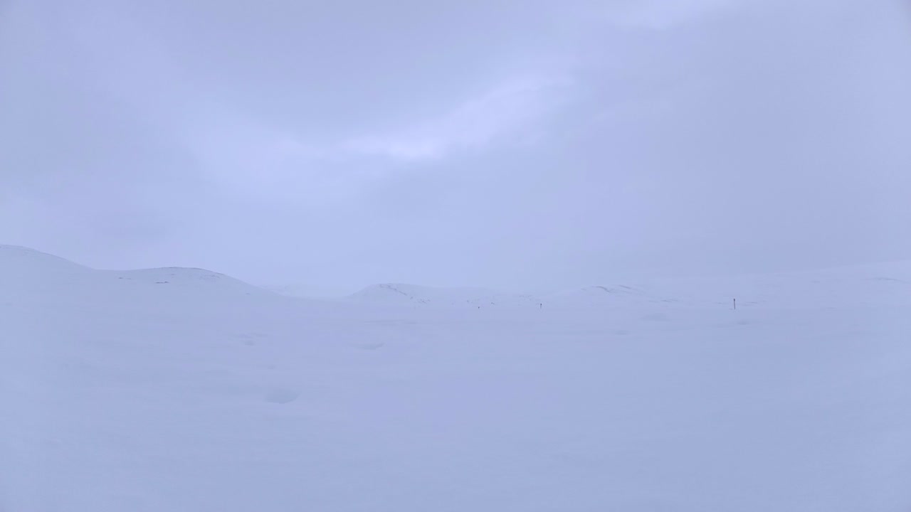 Subtle snowy winter landscape nature background, cloud drift timelapse
