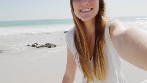 young woman by the sea