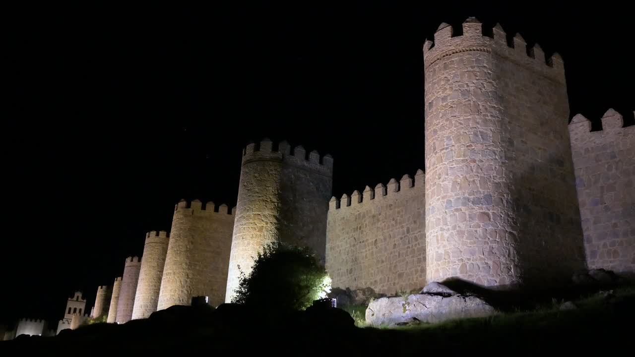 Avila’s old town under the night sky, showcasing the bright, UNESCO-protected medieval walls in Spain.