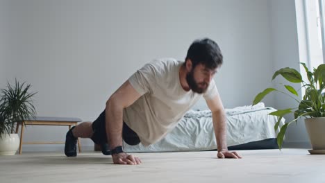 man doing push-ups at home