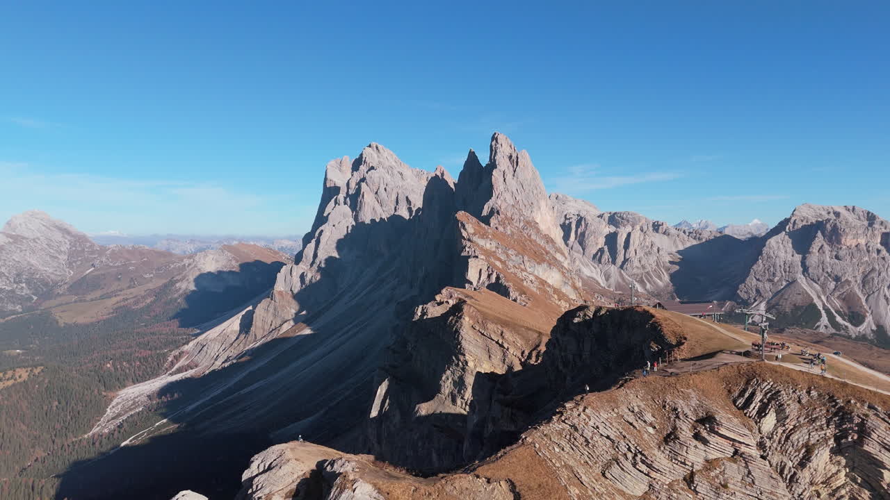 Iconic Seceda Ridgeline with Fermeda Towers, Italian Alps. Drone pullback