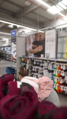 woman shopping for exercise equipment