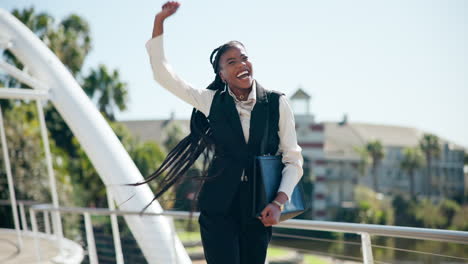 happy businesswoman walking on a bridge