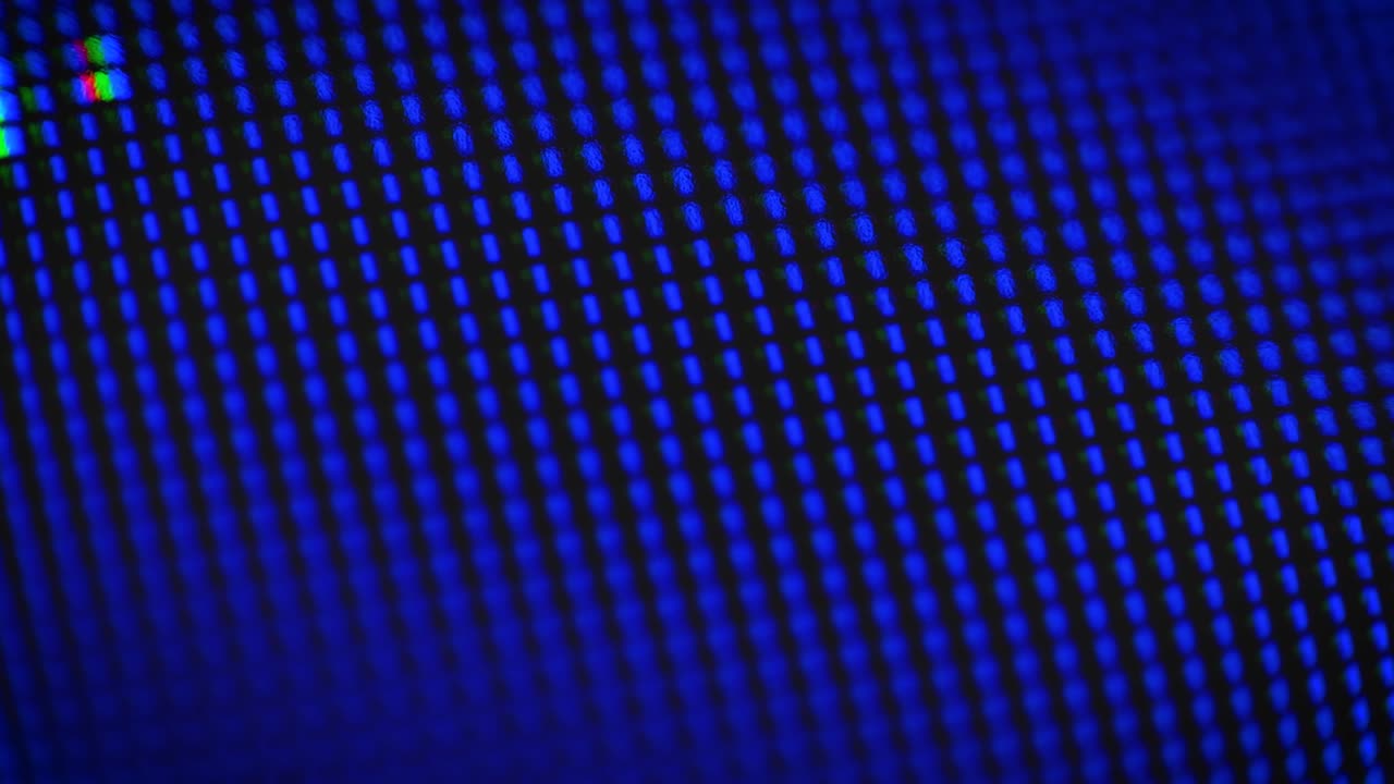 Abstract motion of bright dots on a blue background