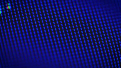 abstract motion of bright dots on a blue background