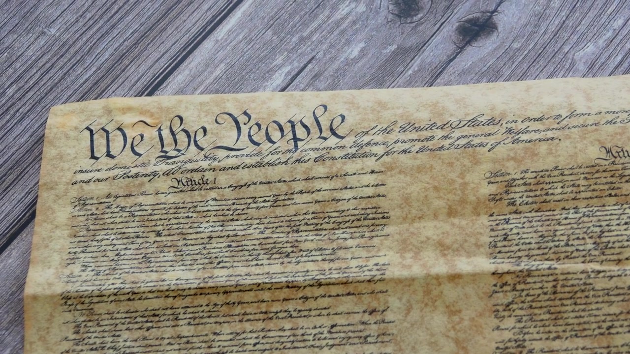 Reading the US Constitution honoring American freedom liberty democracy patriotism and the enduring spirit of the founding fathers and the United States Republi