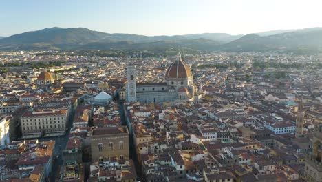 spectacular establishing shot of florence duomo during beautiful sunrise, italy