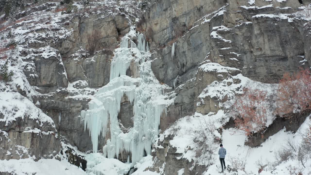 Frozen Waterfall in Winter Landscape