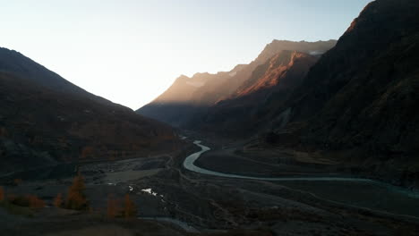 autumn morning sunrise over high altitude mountains