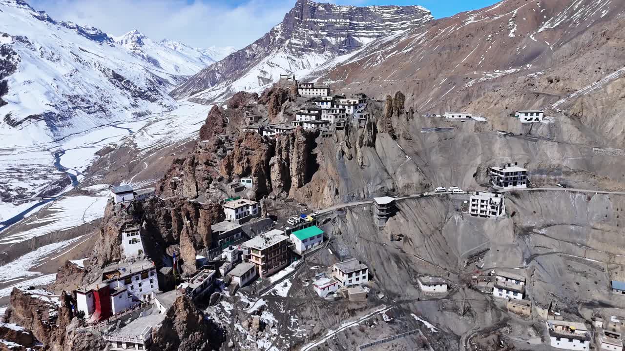 High-altitude Himalayan Monastery nestled in the mountains with snow