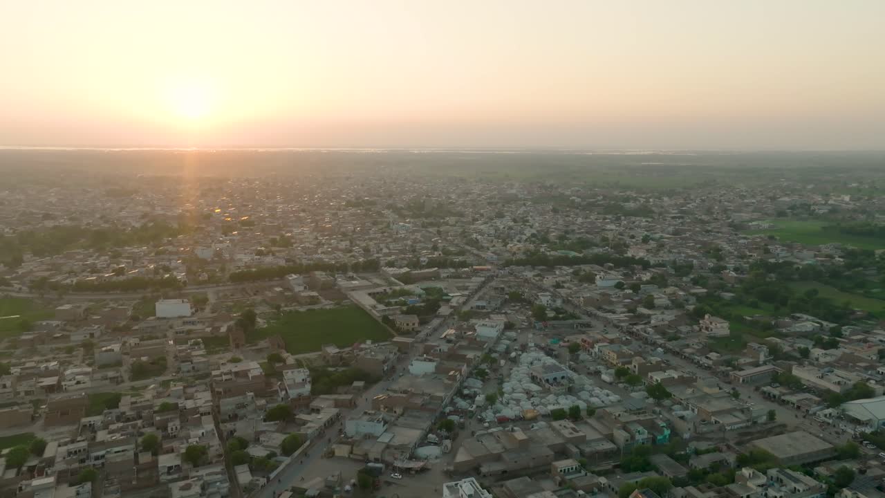 Aerial View of Shujabad Punjab Village with Dense Homes and Fading Light