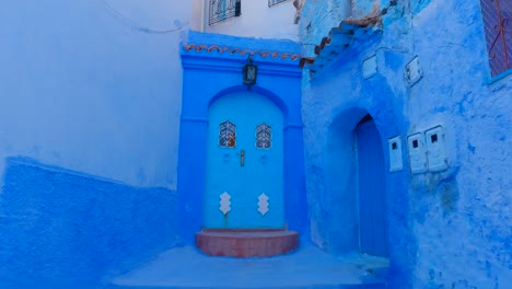 blue painted buildings and doors of famous moroccan city chefchaouen