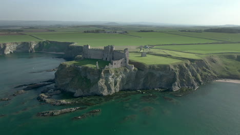 An-aerial-view-of-the-inside-of-Tantallon-Castle-ruin-on-a-sunny-day,-East-Lothian,-Scotland