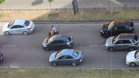 vehicles driving at the asphalt road during daytime in kyiv, ukraine