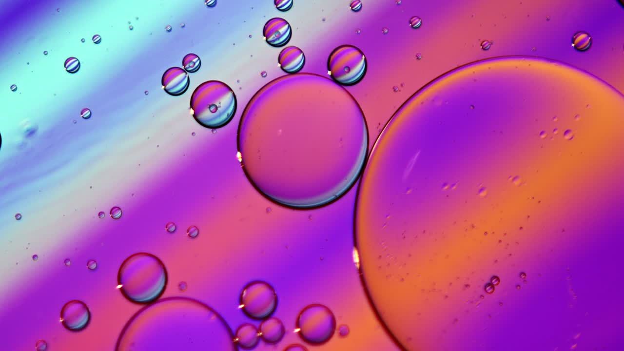 Abstract Colorful Food Oil Drops Bubbles and spheres Flowing