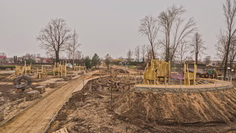 Time lapse of a city park from winter to landscaping in spring