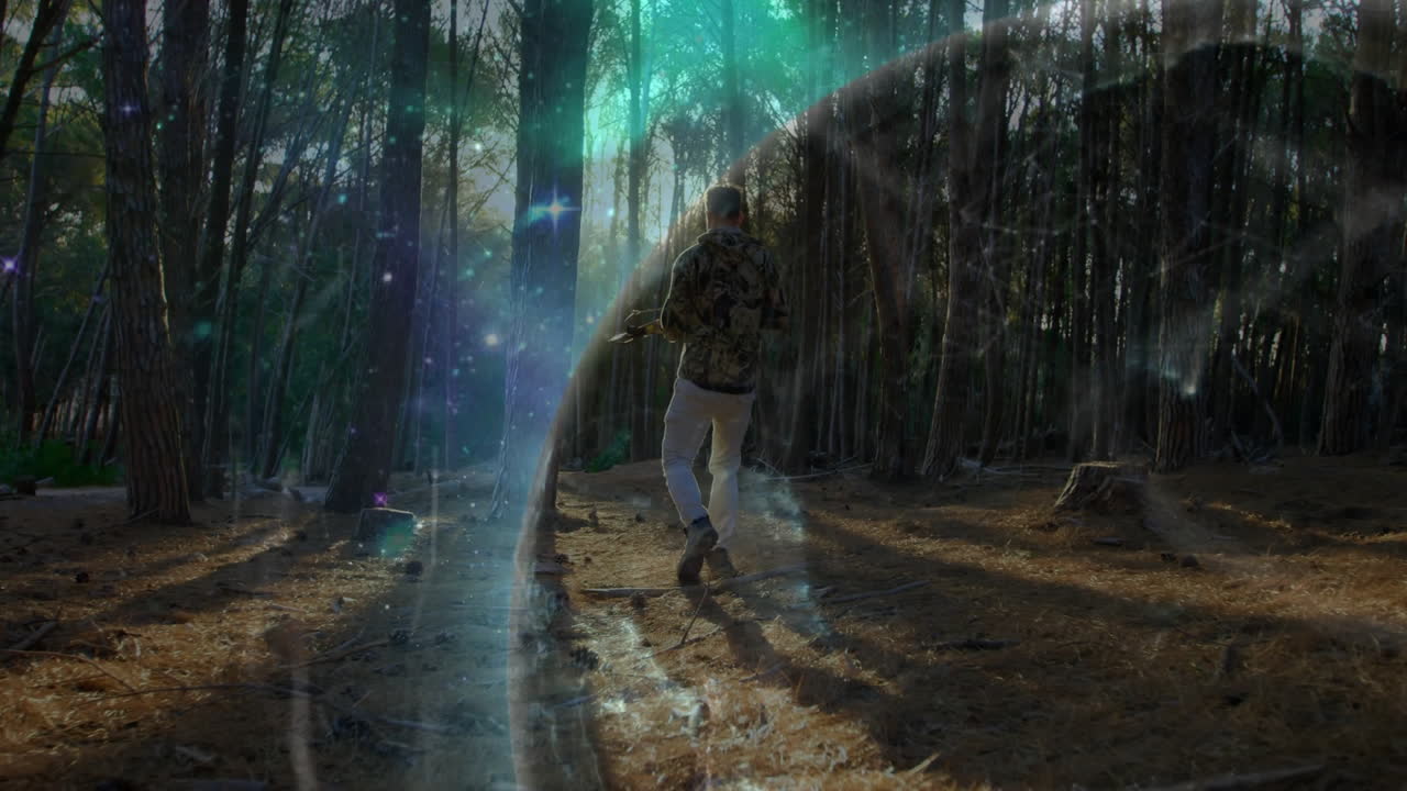 Man holding rifle device standing in pine clearing, showcasing tech-driven portal energy effect