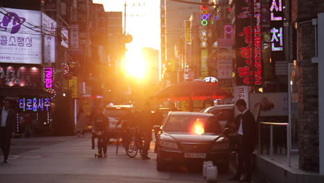 sunset and night views of a busy korean city street