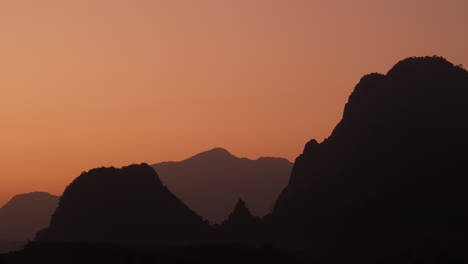 silhouette of mountains at sunrise/sunset