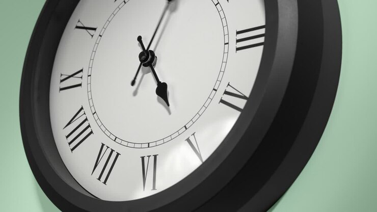 Latin Clock Face on Light Green Wall in Time Lapse