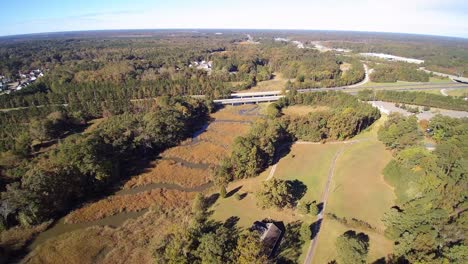 Retreat-from-an-Interstate-along-a-saltwater-estuary-in-a-suburban-setting