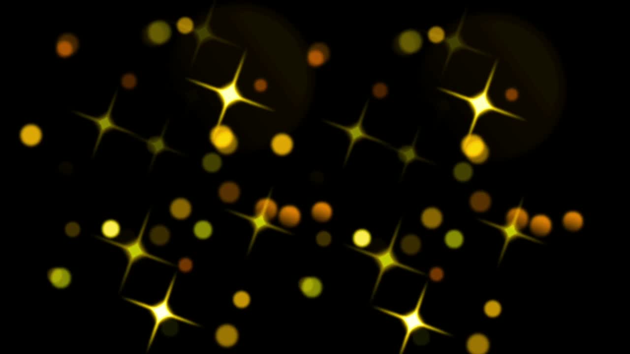 la animación es una luz amarilla que brilla sobre un fondo negro.