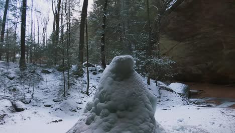 ash cave ice cone, popular and secluded cavern in hocking hills state park during winter in bloomingville, ohio, usa