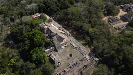 stone pyramid in ruins of ancient mayan acropolis of ek balam, mexico