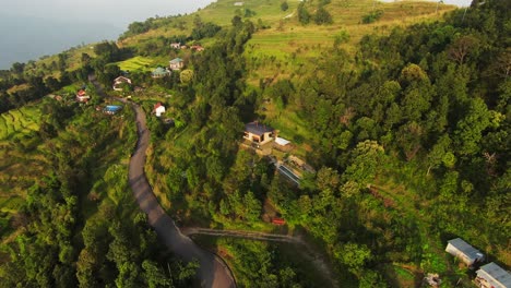 zooming out, a drone captures an authentic village landscape and lifestyles in nepal