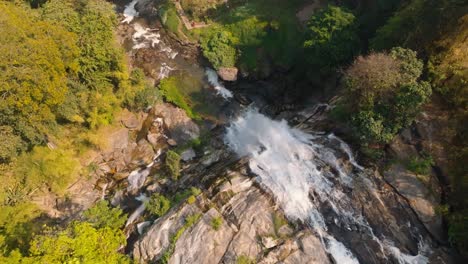 4K-aerial-drone-footage-of-Wachirathan-Waterfall,-Chiang-Mai,-Thailand,-Asia