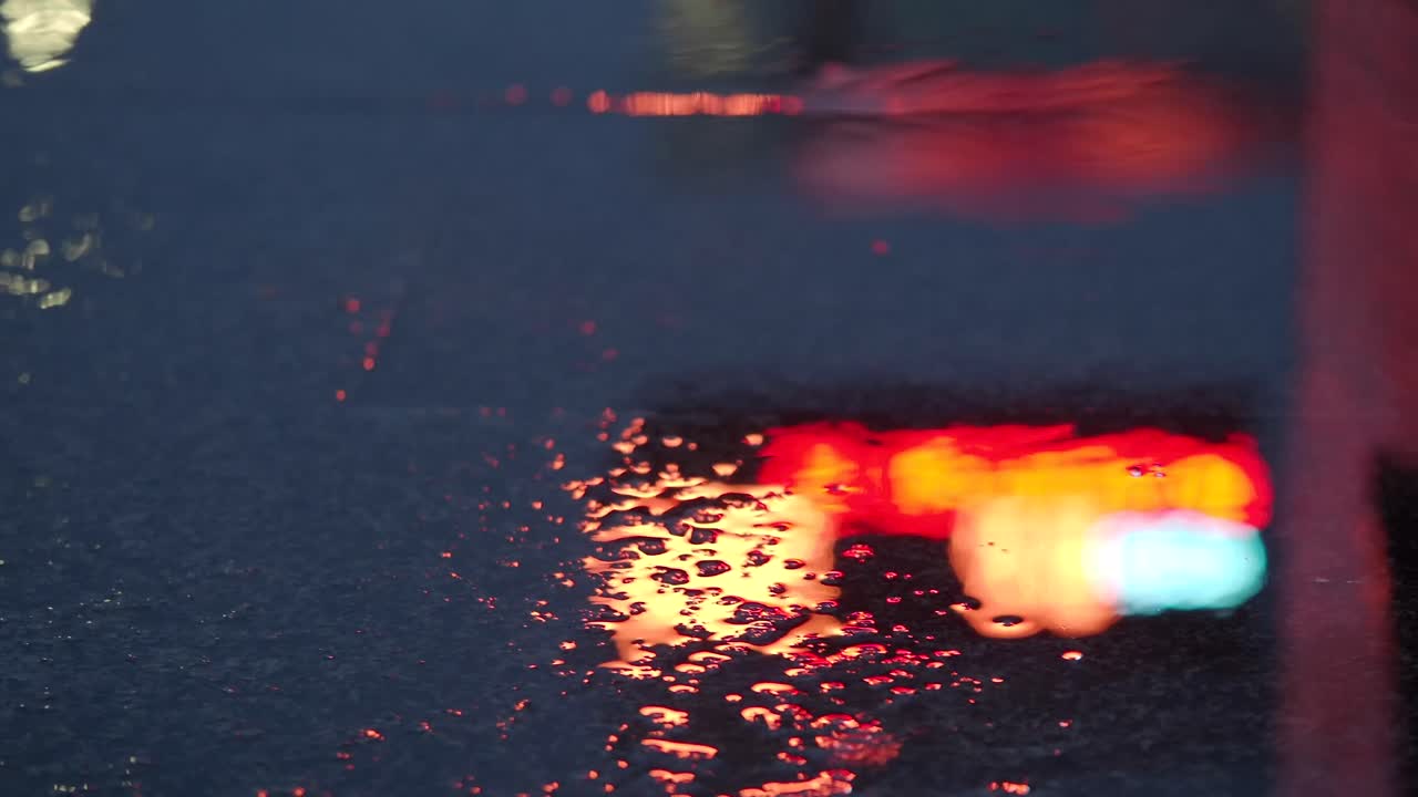 Rain-slicked City Night Reflections
