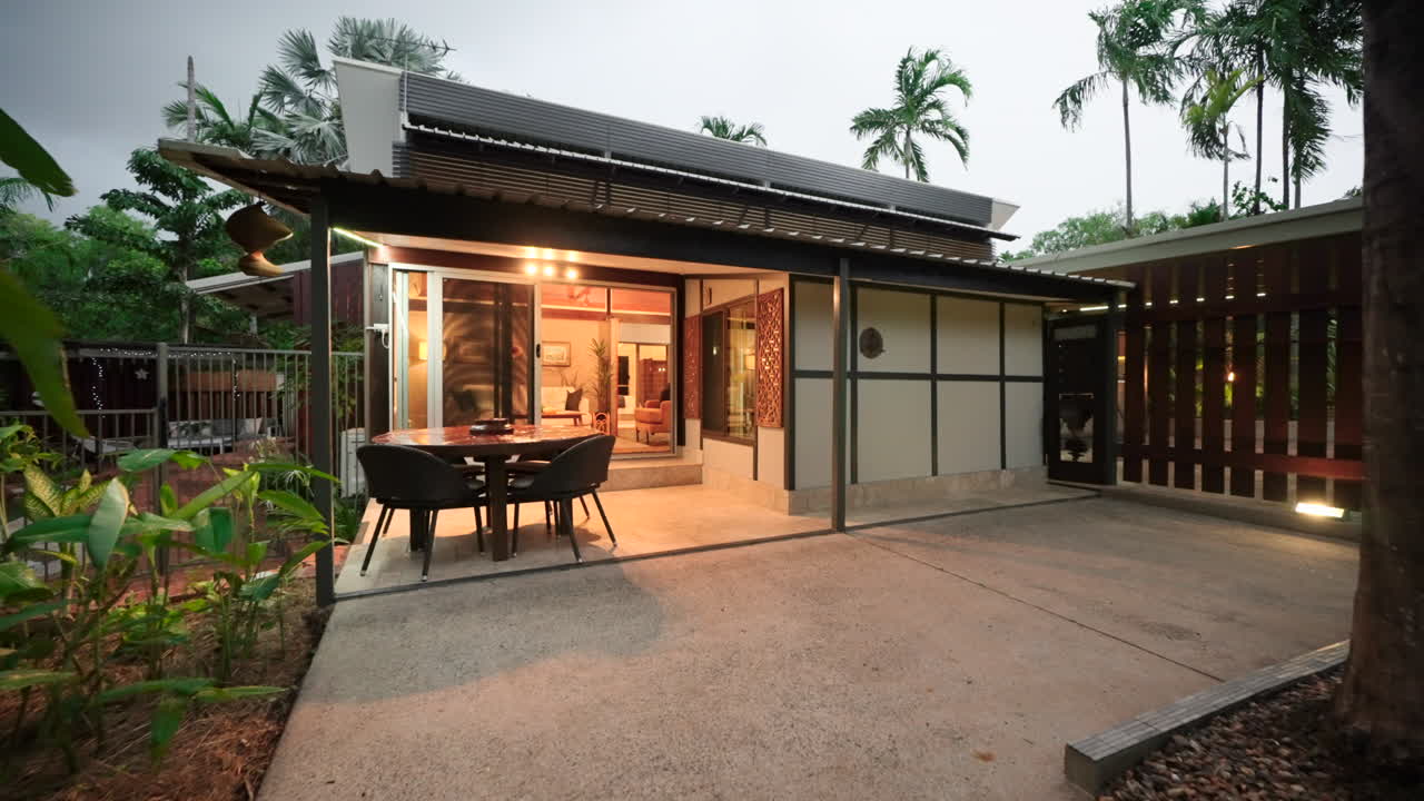 Modern Tropical House Exterior at Night