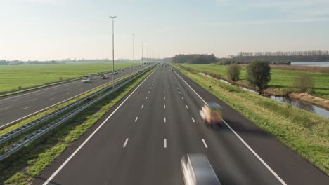 vehicle traffic driving on busy dutch highway, time lapse