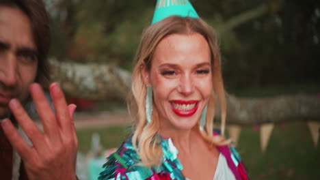 friends celebrating birthday in a park