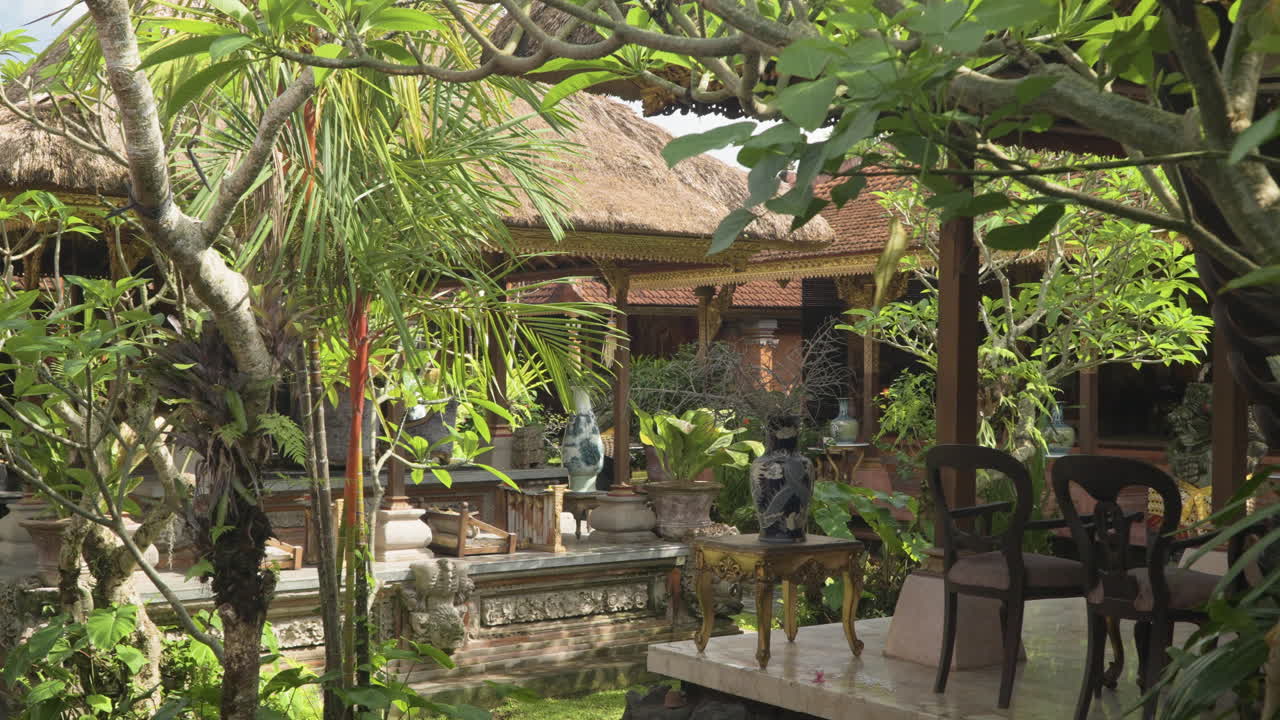 Balinese Royal Traditional Exterior Design in Ubud Palace, Facilities with Lush Exotic Plants and Trees, Ancient Vases and Funiture, Open Pavilion for Resting