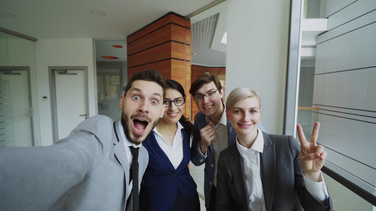 Business Team Selfie in Modern Office