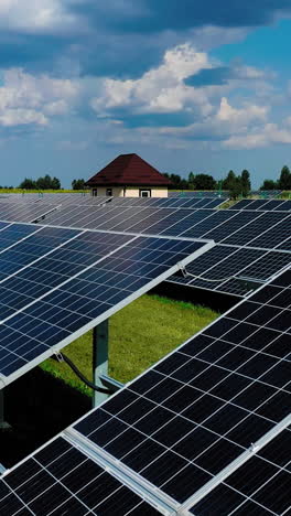aerial view. top view on blue solar pannels. green energy. pannels in the field. vertical video
