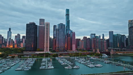 aerial tracking shot of the new eastside and dusable harbor, sunrise in chicago