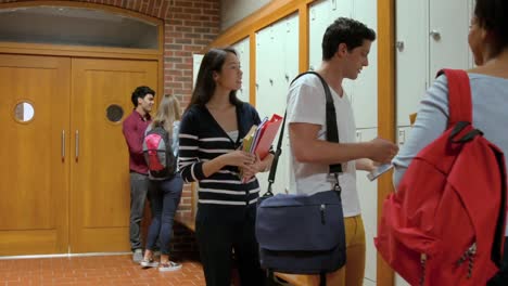 students opening lockers