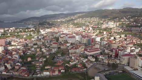 aerial view of the district of teis in vigo city on a grey day. galicia