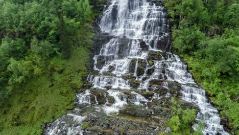 aerial footage from tvindefossen waterfall, norway
