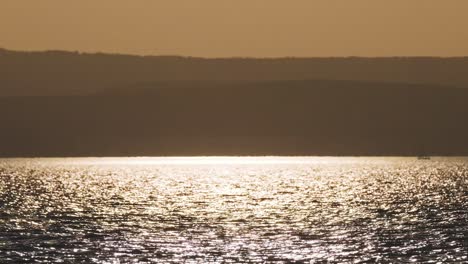 sunset moment in the middle of the lake balaton